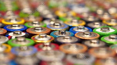 Many multicolored AA batteries