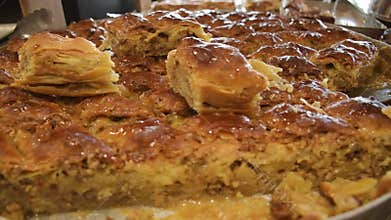 Display of plates full of freshly baked armenian style delight candy deserts in famous Tsovagyugh food court in Armenia