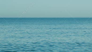 Background Of Summer Morning Look Calm With Deep Blue Water. Seascape View With Blue Sky.