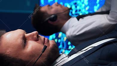 Workplace of the air traffic controllers in the control tower. Team of professional aircraft control officers works