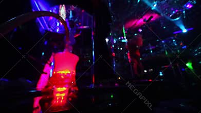 Water boils in hookah with red light during strip