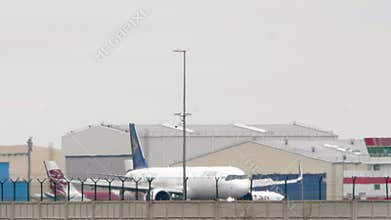 Airbus A321 of Air Astana braking, spoilers up