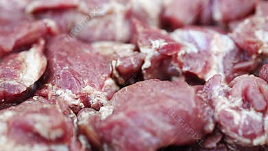 Preparing skewers with juicy marinated meat for grilling