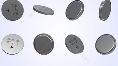 Coin Cells Falling on a Light Blue Background. Lithium Batteries 3D Animation. 4K