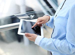 Business woman working with a digital tablet