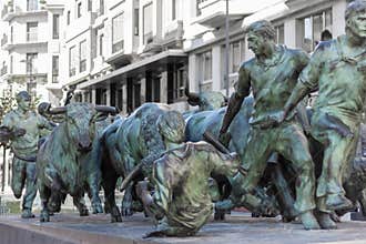 Bull running monument statue in Pamplona, Spain