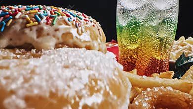 Tempting table setting featuring juicy hamburger patty paired with crispy fries and refreshing drink perfectly embodies concept of