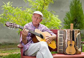 Senior man with guitar
