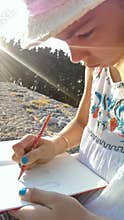 Girl drawing Greek columns