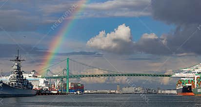 A rainbow over the Port of Los Angeles main channel, Battleship Iowa and Vincent Thomas suspension bridge