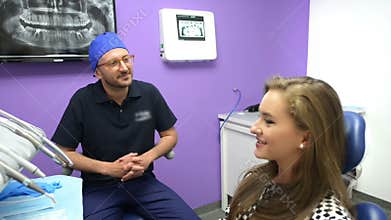 Dentist Welcoming a Patient