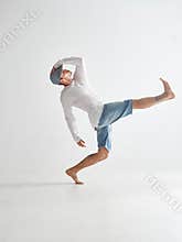 Cool guy breakdancer dancing hip-hop isolated on white background. Dance school poster. Break dance lessons