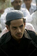A young Muslim at prayer