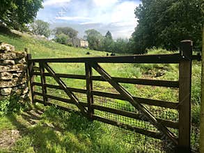 Five barred gate leading to meadow