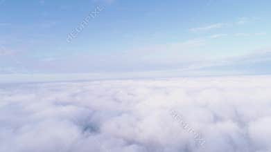 Flight above the clouds. view of the cloudy sky from above