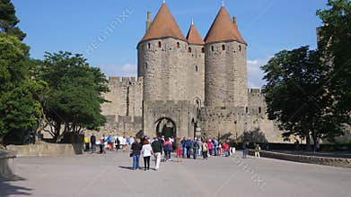 Carcassone Castle visitors queing to enter.
