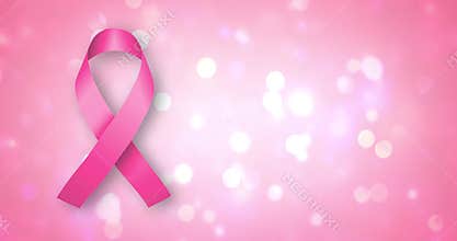 Pink Ribbon with a white lights on a pink background. Breast cancer concept