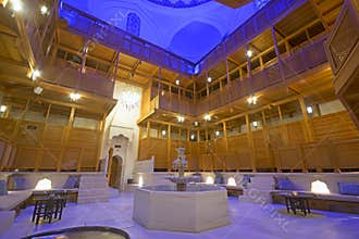 Typical Turkish Hammam Bath with fountain in the middle of rest & changing area at Istanbul, Turkey