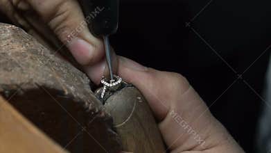Craftsman making diamond ring. Diamond ring product in craftman workshop hand made jewelery