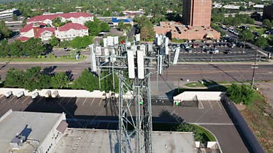 Orbiting shot of a lattice cell tower