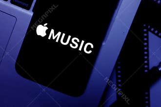 Phone screen with the Apple Music logo which is the Apple Streaming music service