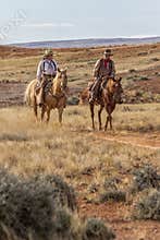 Cowboys Moving the Herd