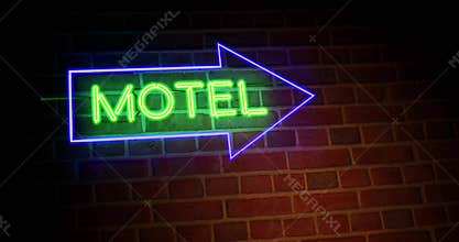Neon motel sign shows motor Lodge location for accommodation - 4k
