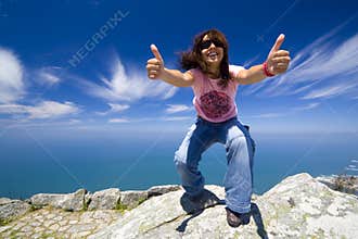 Young girl with thumbs up
