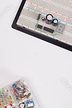 Electrical circuit on breadboard on isolated white