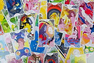 tarot cards spreading flat lay, Star spinner tarot deck, major arcana, the strength tarot card in