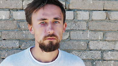 Portrait of european man with bruises, cuts on face