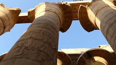 top of columns in karnak temple with ancient egypt hieroglyphics