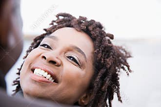 A woman smiling