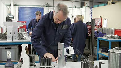 Time Lapse Sequence Of Busy Engineering Workshop