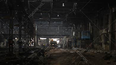 Construction machine inside industrial interior