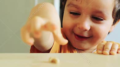 Cheerful boy is having fun