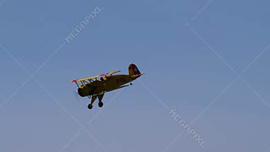 Bucker Bu 133 Jungmeister RC model performing aerobatic maneuvers