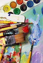 Art palette, picture and mix of paintbrushes