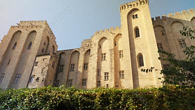 Fortified walls and towers with battlement of the Palais des Papes in Avignon, France