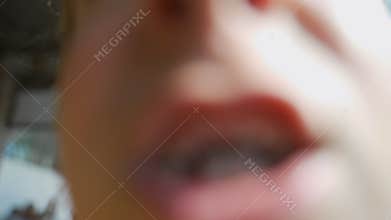 Curious child explores camera lens with playful expressions and closeups