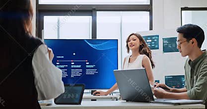 Group of Asian generation z business people work together in home office. Financial team businesspeople brainstorm meeting