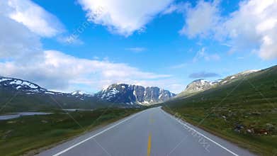 Driving a Car on a Road in Norway