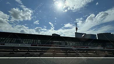 Sunny urban skyline above busy highway with modern office buildings