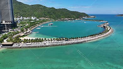 Aerial view of Ana Marina Nha Trang with beach club and parking for yachts in the North of city, central Vietnam.Aerial view of