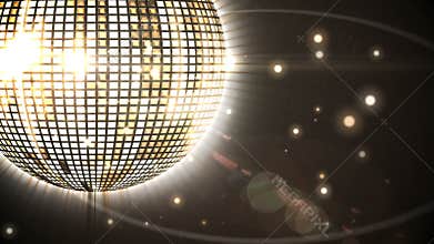 Shiny gold disco ball spinning around