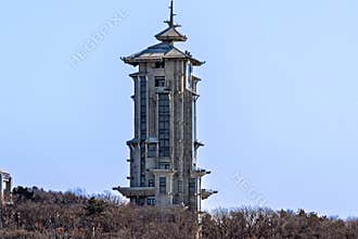 Early Spring Snow - View of the Tower at Jingyuetan National Forest Park, Changchun, China