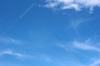 Plane on clear blue sky
