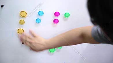 Hand categorise colourful magnet