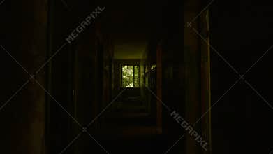 Walking into the abandoned building. Smooth and slow steady cam shot