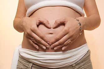 Pregnant girl studio shot